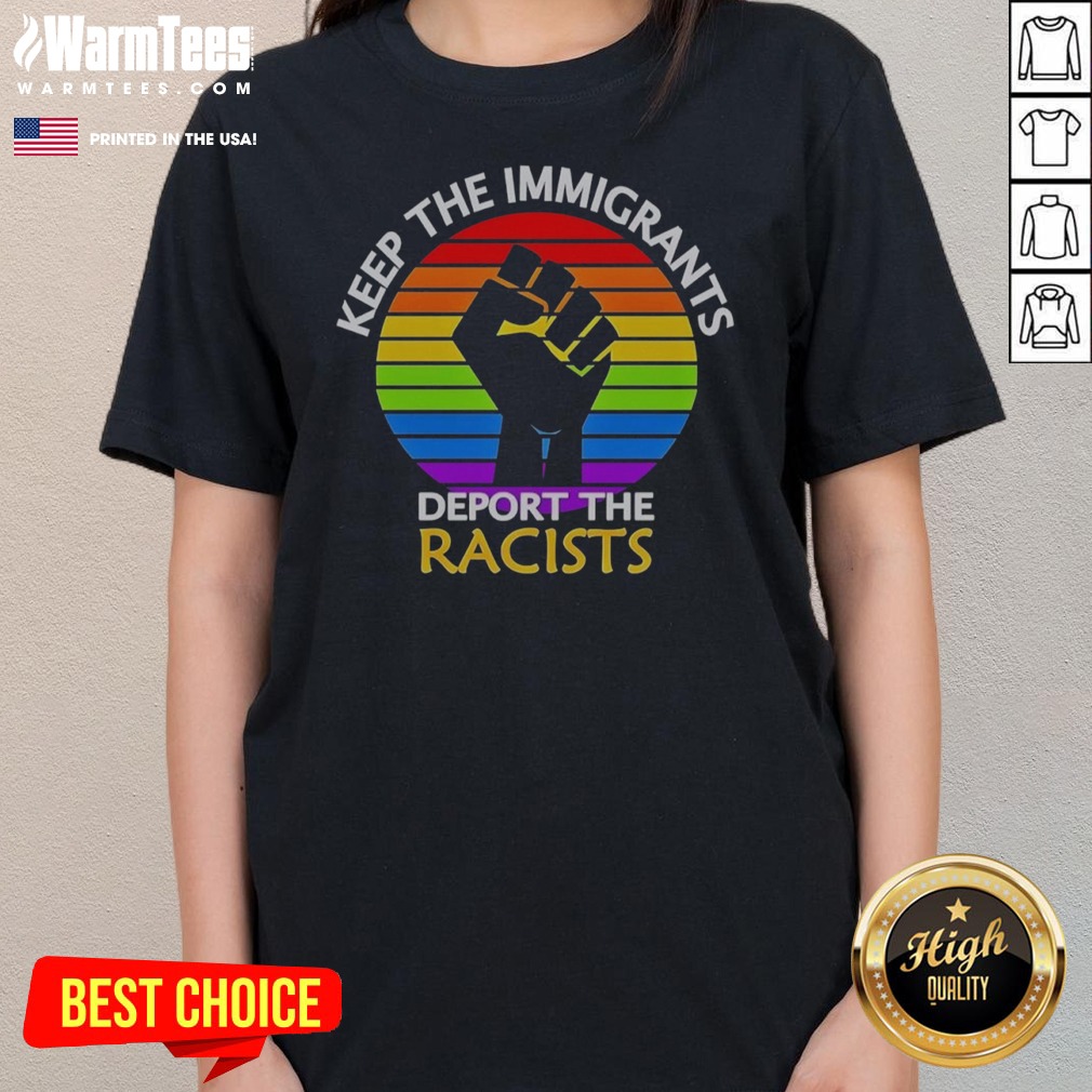 awesome-keep-immigrants-deport-racists-raised-fist-rainbow-flag-solidarity-ladies-tee Awesome Keep Immigrants Deport Racists Raised Fist Rainbow Flag Solidarity ladies tee displayed on a wooden background