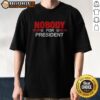 Awesome Nobody For President Peace Sign Shirt displayed on a flat lay background