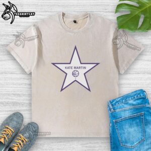 Alt Text: Pretty Kate Martin, basketball star player, wearing a stylish washed t-shirt during a game.