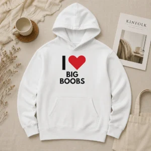 Top I Love Big Boobs Heart Hoodie in black with front graphic print, displayed on a flat lay background
