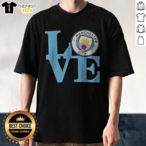 Nice Manchester City LOVE Logo Soccer Fan Apparel Premier League Football Club Shirt displayed on a hanger