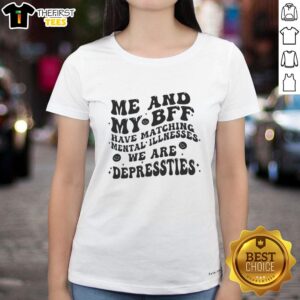 Two friends wearing matching 'Depressties' tees, celebrating their bond over mental illness in a casual setting.
