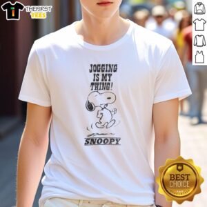 Alt Text: Pretty Snoopy jogging is my thing washed t-shirt featuring Snoopy in a fun, colorful design perfect for casual wear.