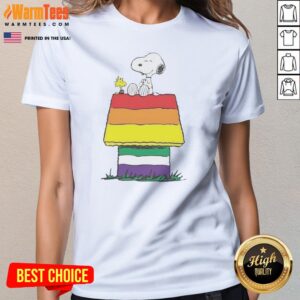 Snoopy Peanuts Happy Pride Month ladies tee featuring vibrant colors and a playful design.