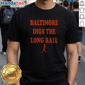 Top Baltimore Orioles Baseball MLB Digs The Long Ball Shirt displayed on a hanger, showcasing vibrant team colors and logo.