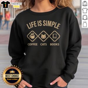 Good Life Is Simple Coffee Cats Books Graphic Novelty Casual Cotton Sweatshirt displayed in a cozy setting