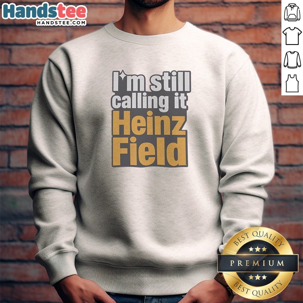 hot-i-m-still-calling-it-heinz-field-pittsburgh-nostalgia-bold-varsity-text-sweatshirt Hot I'M Still Calling It Heinz Field Pittsburgh Nostalgia Bold Varsity Text Sweatshirt in black, featuring bold varsity lettering