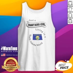 Original Just A Montana Girl Living In A North Dakota World tank top displayed on a wooden background
