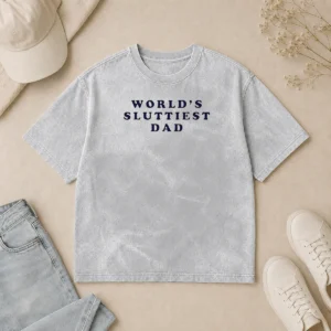 Pretty Worlds Sluttiest Dad Slogan Washed T Shirt in faded color with bold text print