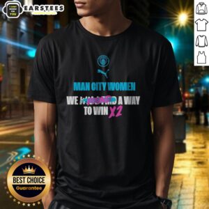 Hot Manchester City We Found A Way To Win X2 shirt displayed on a wooden background