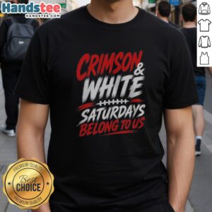 Pretty Crimson And White College Football Saturdays Belong To Us Shirt displayed on a neutral background.