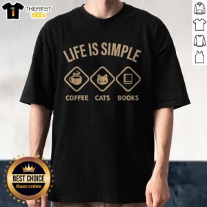 Good Life Is Simple Coffee Cats Books Graphic Novelty Casual Cotton Shirt displayed flat on a wooden surface.