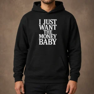 Official I Just Want The Money Baby Hoodie in black with bold white text on front, cozy pullover style