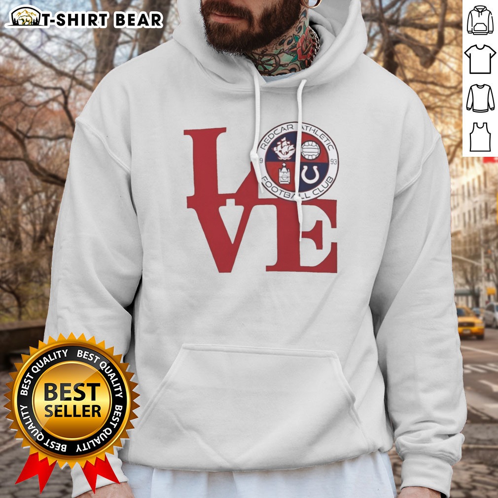nice-redcar-athletic-football-club-love-logo-emblem-football-sport-fan-soccer-club-hoodie Nice Redcar Athletic Football Club Love Logo Emblem Football Sport Fan Soccer Club Hoodie displayed in a cozy setting.