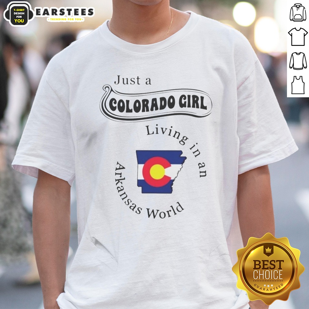 official-just-a-colorado-girl-living-in-an-arkansas-world-shirt-1 Official Just A Colorado Girl Living In An Arkansas World shirt displayed on a hanger with a scenic background