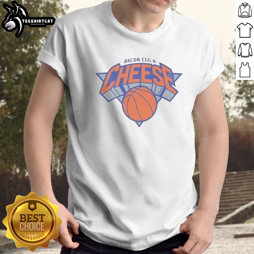 official-new-york-knicks-bacon-egg-n-cheese-shirt-1 Official New York Knicks Bacon Egg N Cheese Shirt displayed on a hanger against a vibrant background.