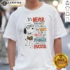 Original Snoopy Peanuts It Is Never Too Late To Be What You Want Unless You Are Fcked graphic print on a black short sleeve shirt