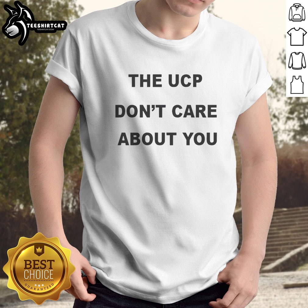 original-the-ucp-don-t-care-about-you-black-text-shirt Original The Ucp Don'T Care About You Black Text Shirt displayed on a wooden background