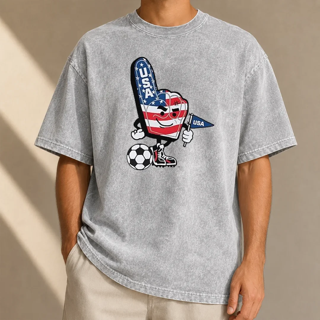 original-usa-soccer-mascot-foam-finger-with-ball-and-pennant-washed-t-shirt Original USA Soccer Mascot Foam Finger With Ball And Pennant on a soft washed t shirt in white