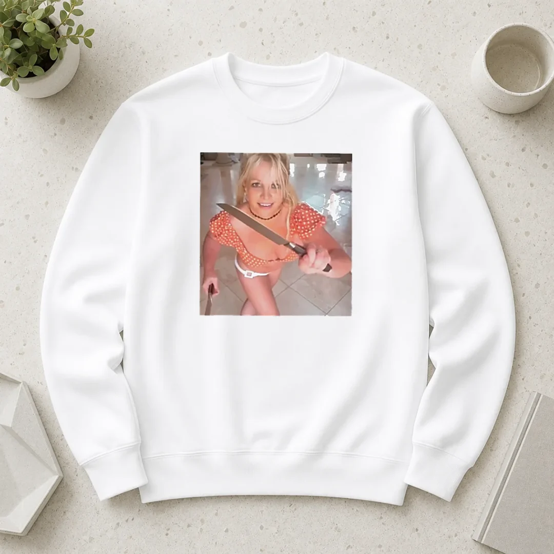 premium-britney-spears-butcher-baby-knife-dance-sweater Premium Britney Spears Butcher Baby Knife Dance sweater in black with bold graphic print and crew neck design