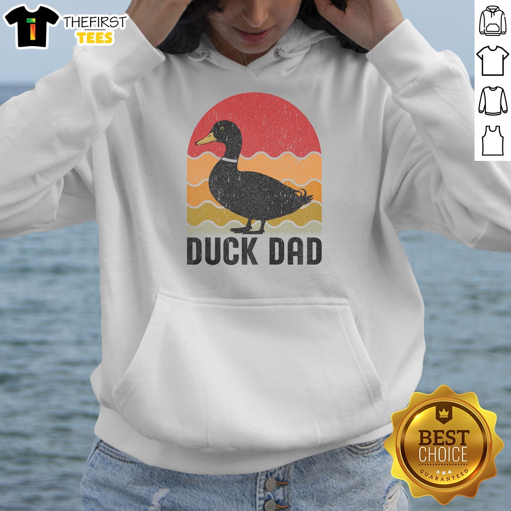pretty-duck-dad-hoodie Pretty Duck Dad Hoodie displayed on a wooden background, showcasing vibrant colors and a cozy fit.