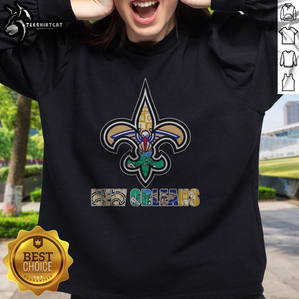 pretty-nola-saints-pelicans-tulane-fleur-de-lis-logo-sweatshirt Pretty NOLA Saints Pelicans Tulane Fleur De Lis Logo Sweatshirt featuring a vibrant design.