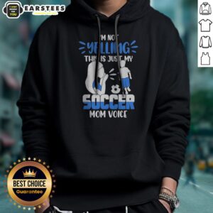Official I'M Not Yelling This Is Just My Soccer Mom Voice hoodie in black with front graphic print, cozy pullover style