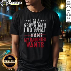 Funny Girl Dad I'M A Grown Man I Do What My Daughter Wants shirt displayed on a wooden background
