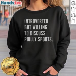 Hot Introverted But Willing To Discuss Philly Sports Philadelphia Sports Fan sweatshirt displayed in a cozy setting.