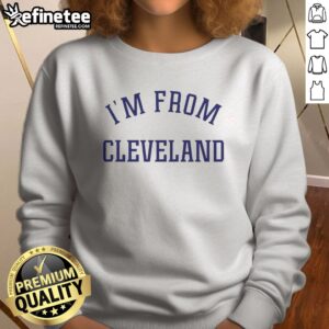 Premium Travis Kelce I'M From Cleveland sweatshirt in a cozy setting, perfect for fans.