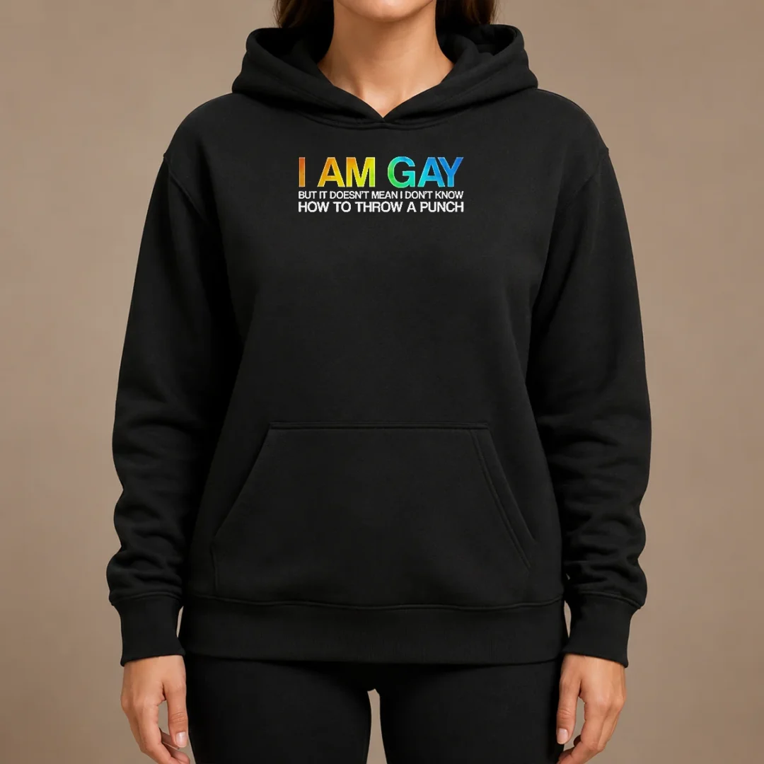 Top I Am Gay But It Doesn'T Mean I Don'T Know How To Throw A Punch Hoodie Top I Am Gay But It Doesn'T Mean I Don'T Know How To Throw A Punch hoodie in black with bold white text design