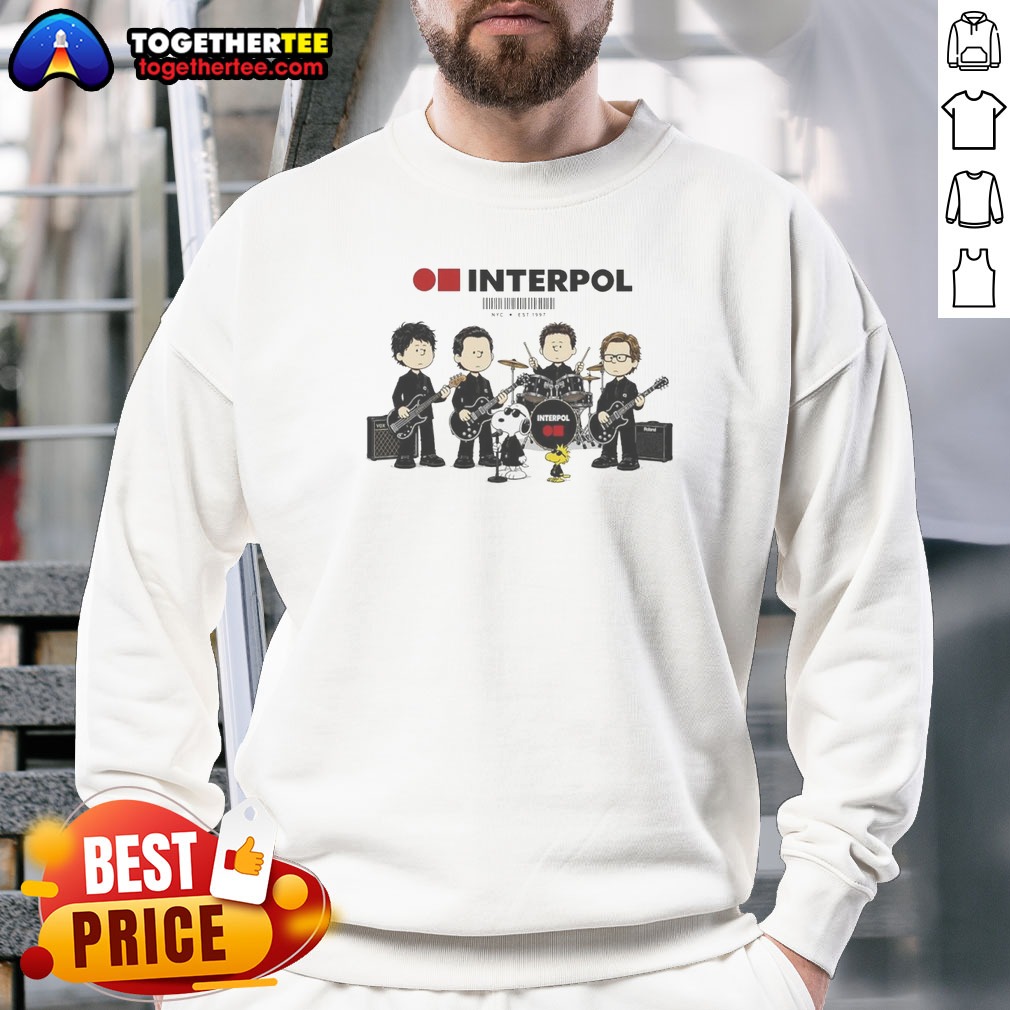 Top Interpol Snoopy Charlie Brown Peanuts NYC Est 1997 Sweatshirt Top Interpol Snoopy Charlie Brown Peanuts NYC Est 1997 Sweatshirt in heather gray with graphic print