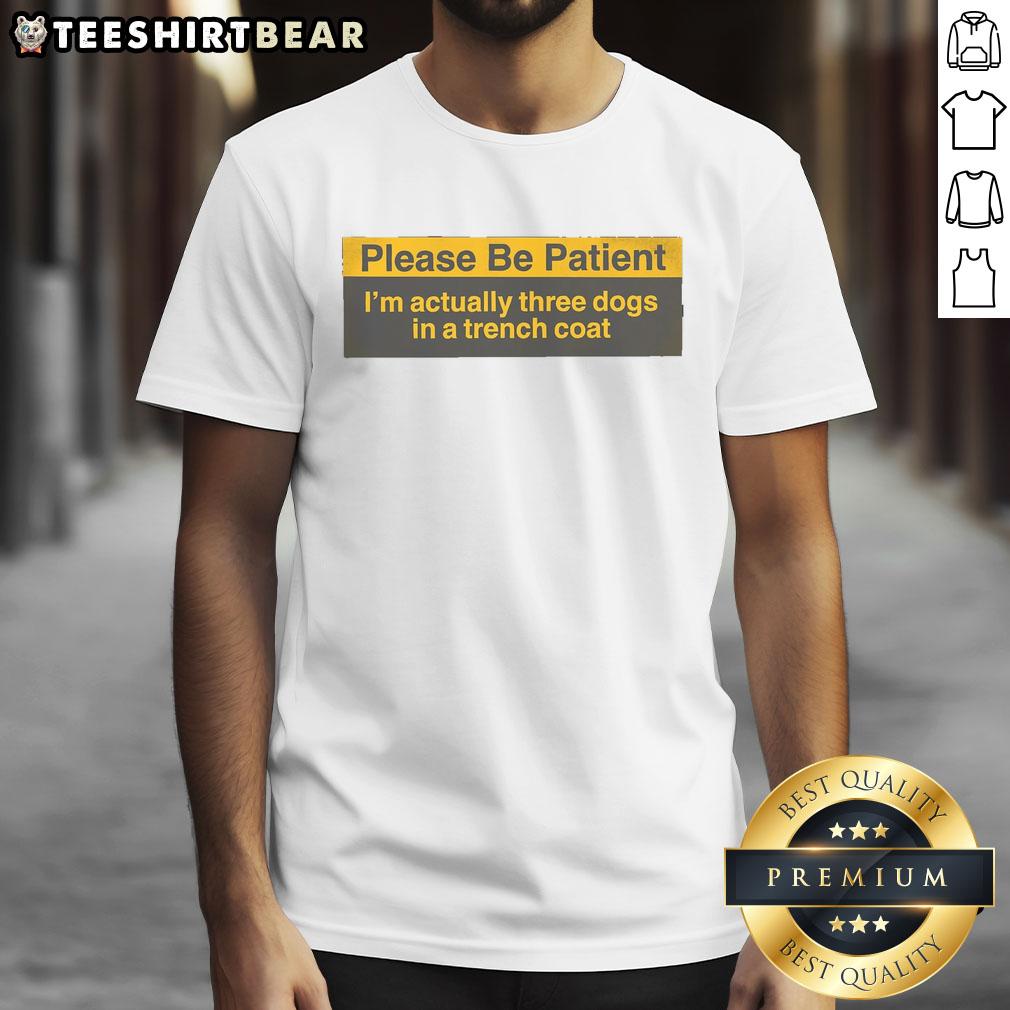 top-please-be-patient-im-actually-three-dogs-in-a-trench-coat-t-shirt-1 Alt Text: Funny 'Please Be Patient Im Actually Three Dogs In A Trench Coat' T-Shirt design featuring three cartoon dogs.