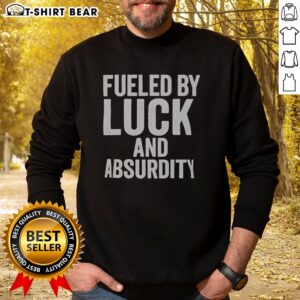 Awesome Fueled By Luck And Absurdity Retro Distressed Typography Inspiration Sweatshirt in a cozy setting