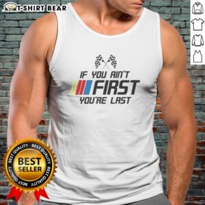 Original Ricky Bobby Talladega Nights NASCAR Racing If You Aint First Youre Last Tank Top displayed in a vibrant setting.