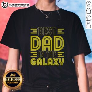 Top Best Dad In The Galaxy Birthday Father'S Day Ladies Shirt displayed on a wooden background