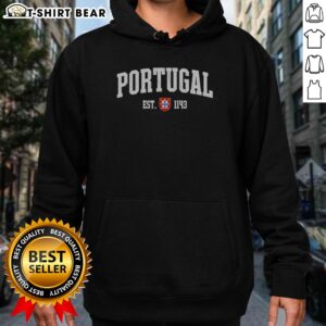 Pretty Portugal Est 1143 Shield Crest Vintage Distressed Style Graphic Hoodie in a cozy setting.