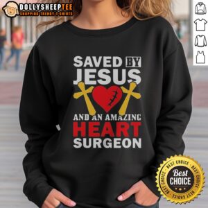 Original Saved By Jesus And An Amazing Heart Surgeon Sweatshirt displayed on a neutral background.