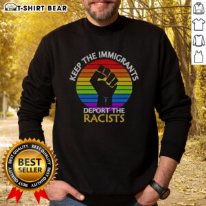 Good Keep Immigrants Deport Racists Raised Fist Rainbow Flag Solidarity Sweatshirt featuring bold graphics and vibrant colors.