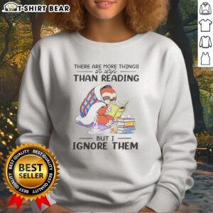 Hot Sloth Bookworm There Are More Things To Life Than Reading But I Ignore Them Sweatshirt featuring a playful sloth illustration.
