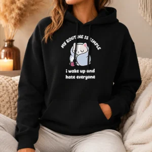 Premium My Routine Is Simple I Wake Up And Hate Everyone Cat Hoodie in black with front cat graphic and text