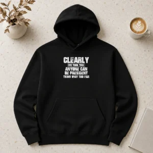 Nice Clearly We Took This Anyone Can Be President Thing Way Too Far Hoodie in dark gray, front view with drawstring hood and kangaroo pocket