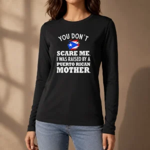 Good You Don'T Scare Me I Was Raised By A Puerto Rican Mother long sleeve shirt in black, front view with bold white text design