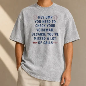 Premium Hey Ump You Need To Check Your Voicemail Because You Have Missed A Lot Of Calls printed on a soft washed t shirt in neutral color