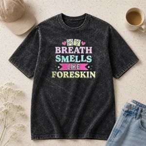 Funny My Breath Smells Like Foreskin Washed T Shirt in light grey showing front print and soft fabric texture