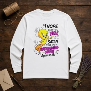 Premium Tweety Nope I Can'T Go To Hell Satan Still Has A Restraining Order Against Me long sleeve shirt in black with bold graphic print