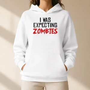 Funny Premium I Was Expecting Zombies Hoodie in black with bold white text on the front