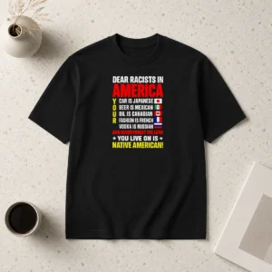 Hot Dear Racists In America You Live On Is Native American graphic t shirt in black, front view