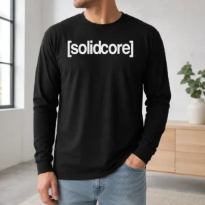 Premium Solidcore Merch Logo long sleeve shirt in black with white logo on front, displayed on a flat lay