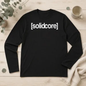 Official Solidcore Merch Logo Long Sleeve Shirt in black with white logo printed on chest